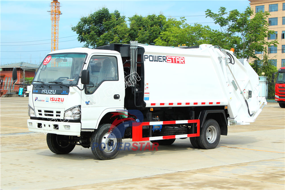 caminhão compactador de lixo isuzu