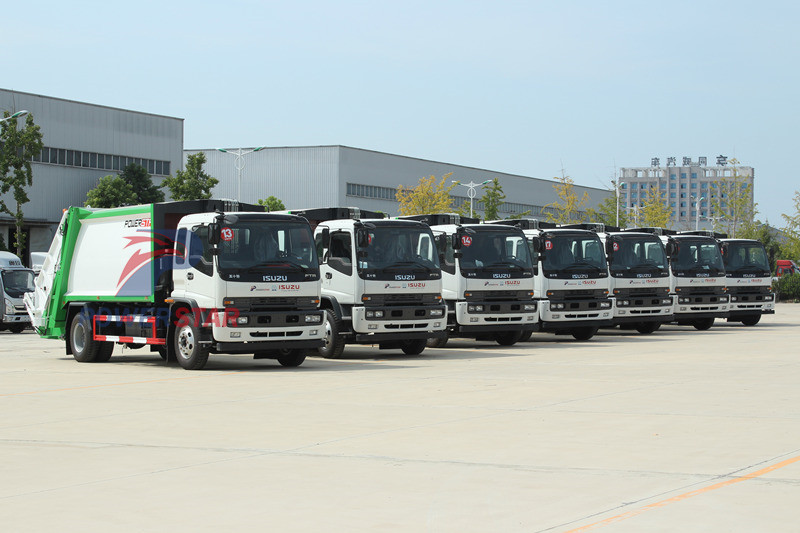 Mongólia - Caminhão de lixo Isuzu FVR e caminhão guindaste NPR
    